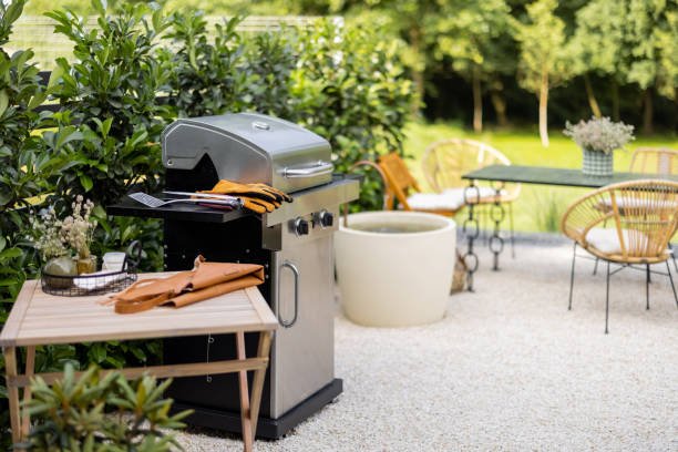 Beautiful backyard with barbeque area and dining table