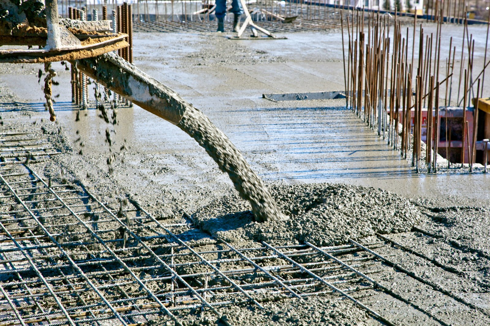 Concrete,Pouring,During,Commercial,Concreting,Floors,Of,Buildings,In,Construction